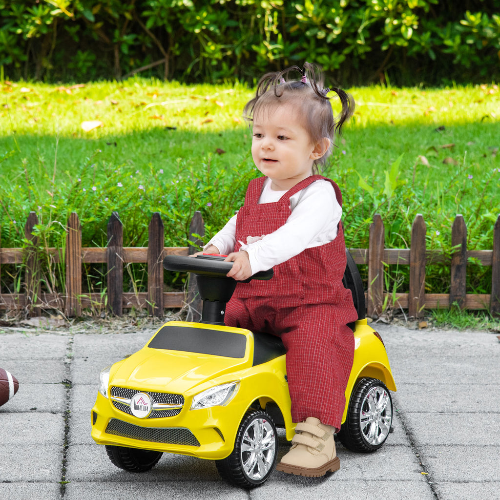 HOMCOM Kinderfahrzeug Rutschauto mit Lenkrad, Scheinwerfern und integrierter Musik, Kinderfahrzeug aus PP und Metall, 63,5x28x36 cm, Gelb